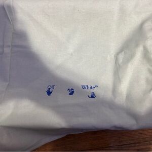 Off-White Tee with Blue Logo